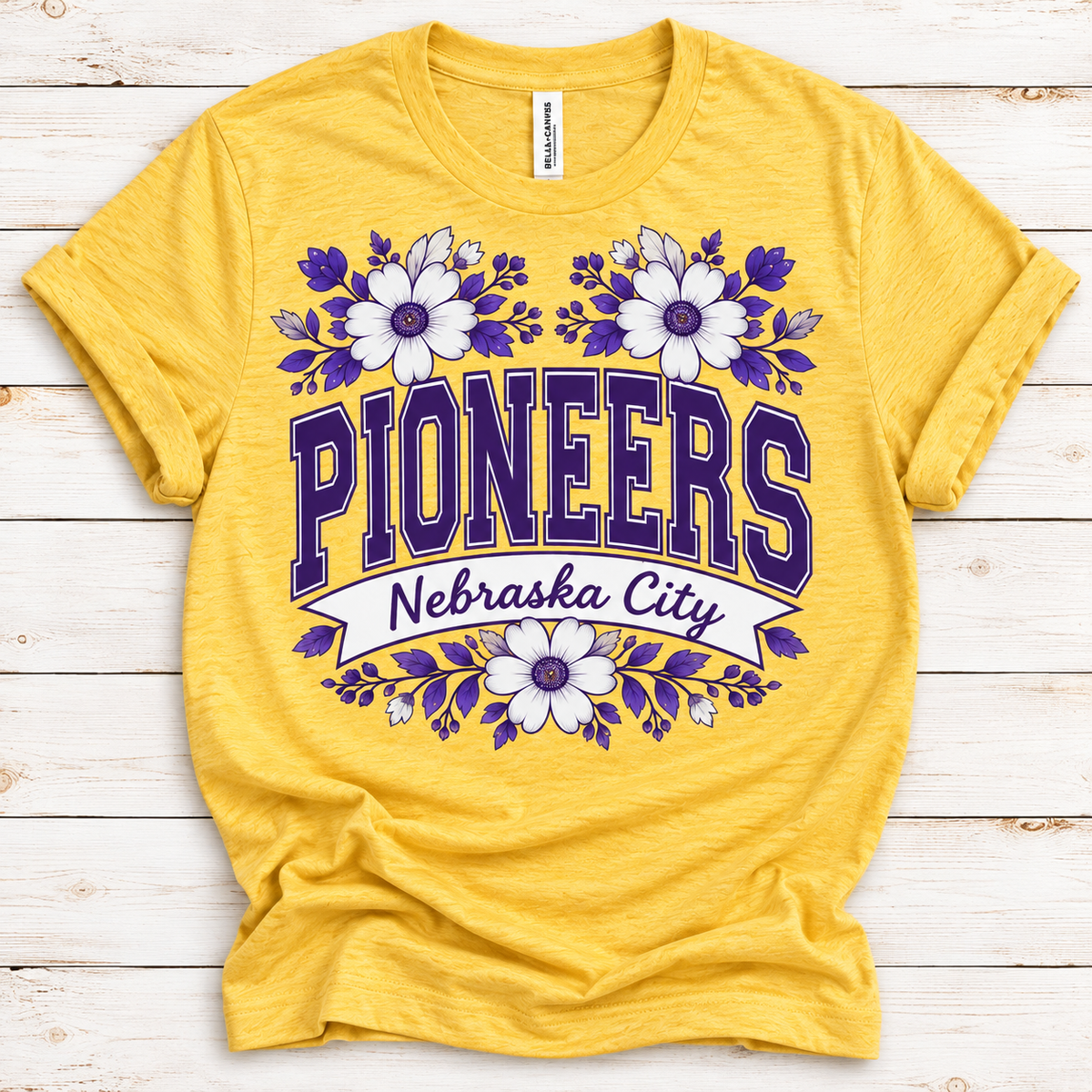 Nebraska City Pioneers Floral Spirit Tee (Bella+Canvas Heather Yellow)